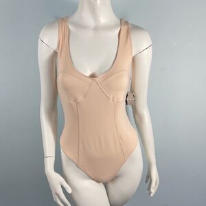 NWT Free People Movement Bare It All Thong Bodysuit M Nude Peach‎ Minimalist